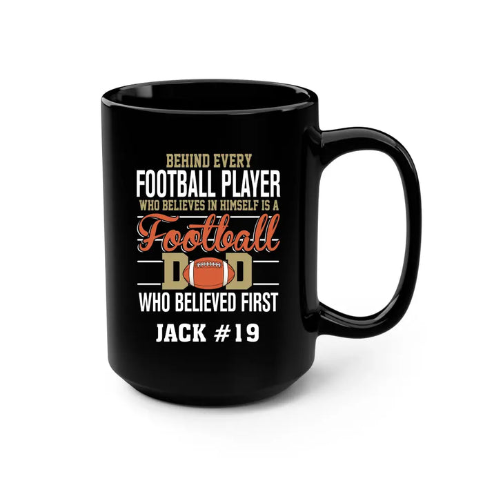 Personalized Behind Every Football Player Who Believes In Himself Is A Football Dad Who Believe First Mug, Custom Mug For Football Dad, Football Mom