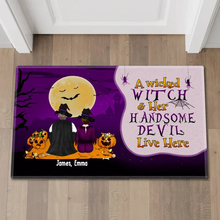 A Wicked Witch Her Handsome Devil Live Here - Personalized Gifts Custom Halloween Doormat For Couples