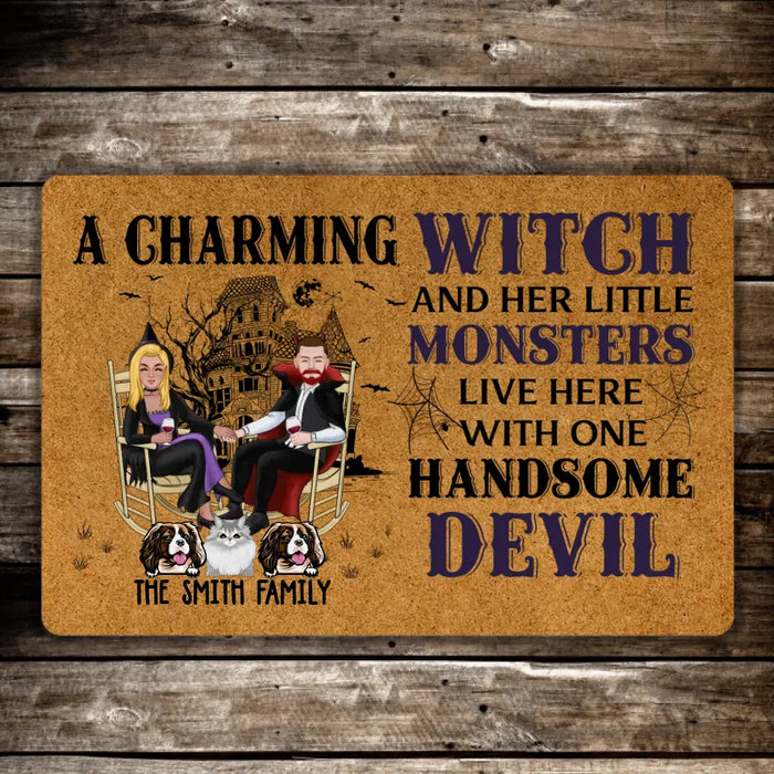A Charming Witch and Her Little Monsters Live Here with One Handsome Devil - Personalized Gifts Custom Halloween Doormat for Fur Family, Dog Cat Lovers